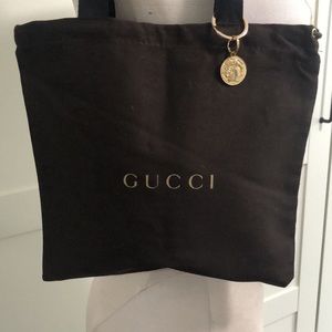 Repurposed Gucci tote with gold Roman coin